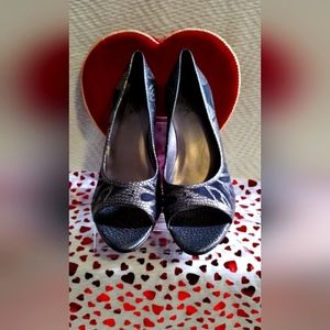 Carlos Santana heels